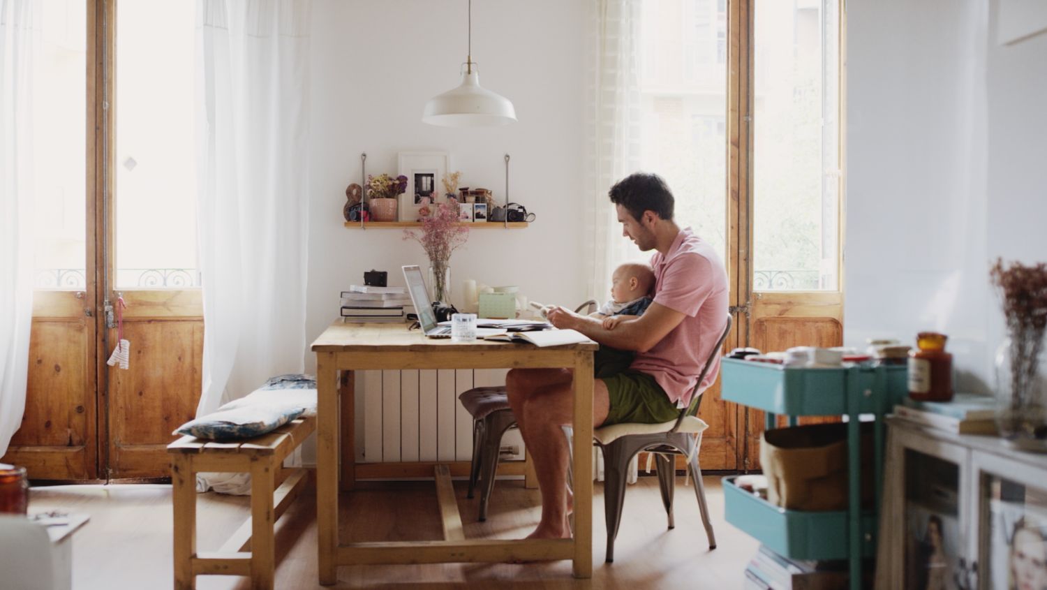 Father in home office with children