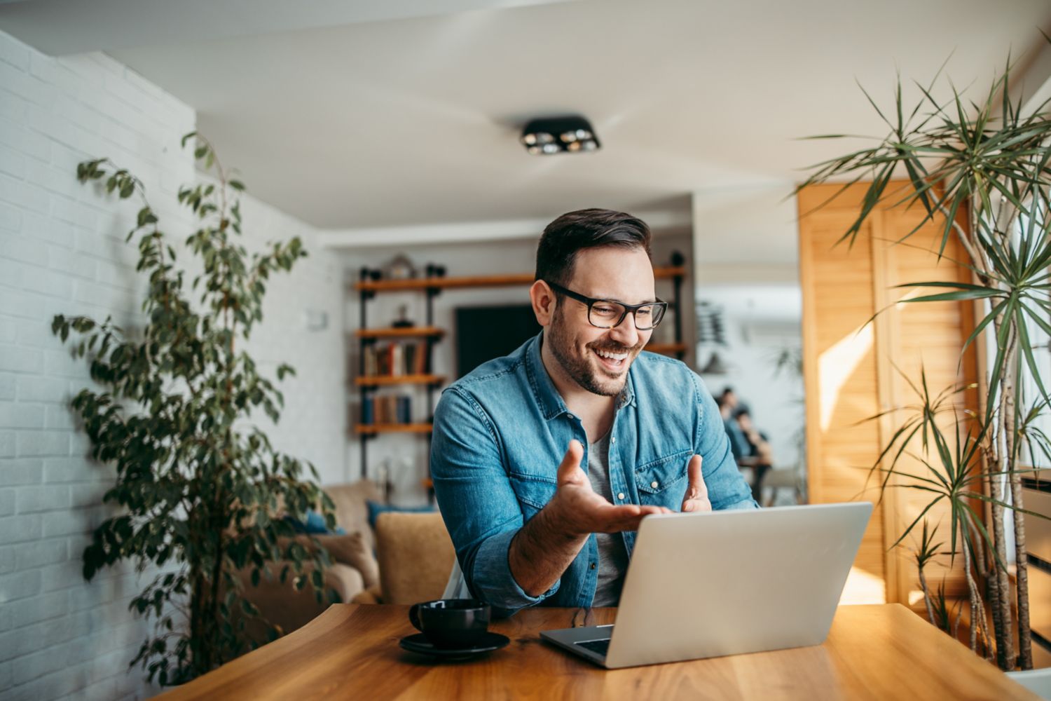 Happy man in front of PC