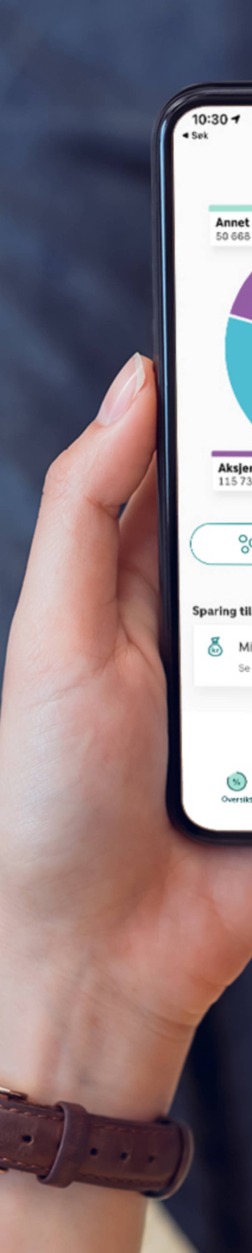 Image of someone sitting on the floor with the Savings app on their mobile