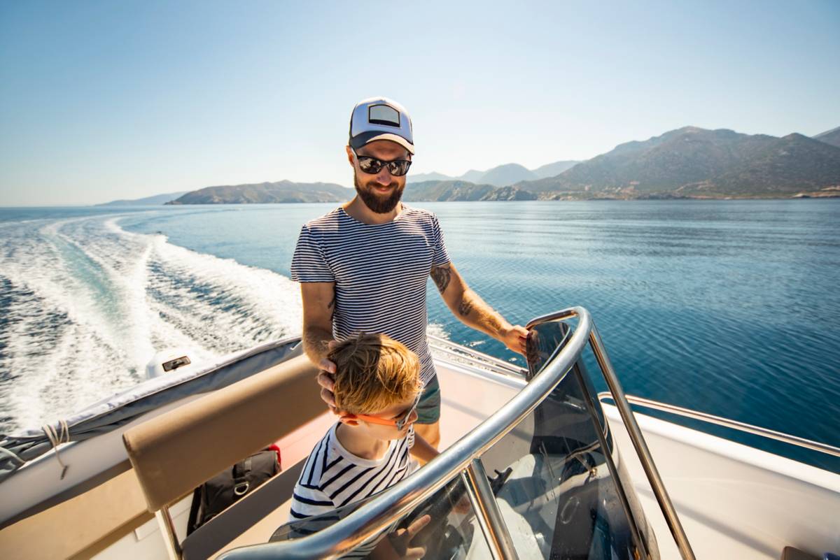 Father and son on a boat
