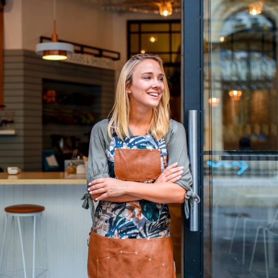 Woman in front of café
