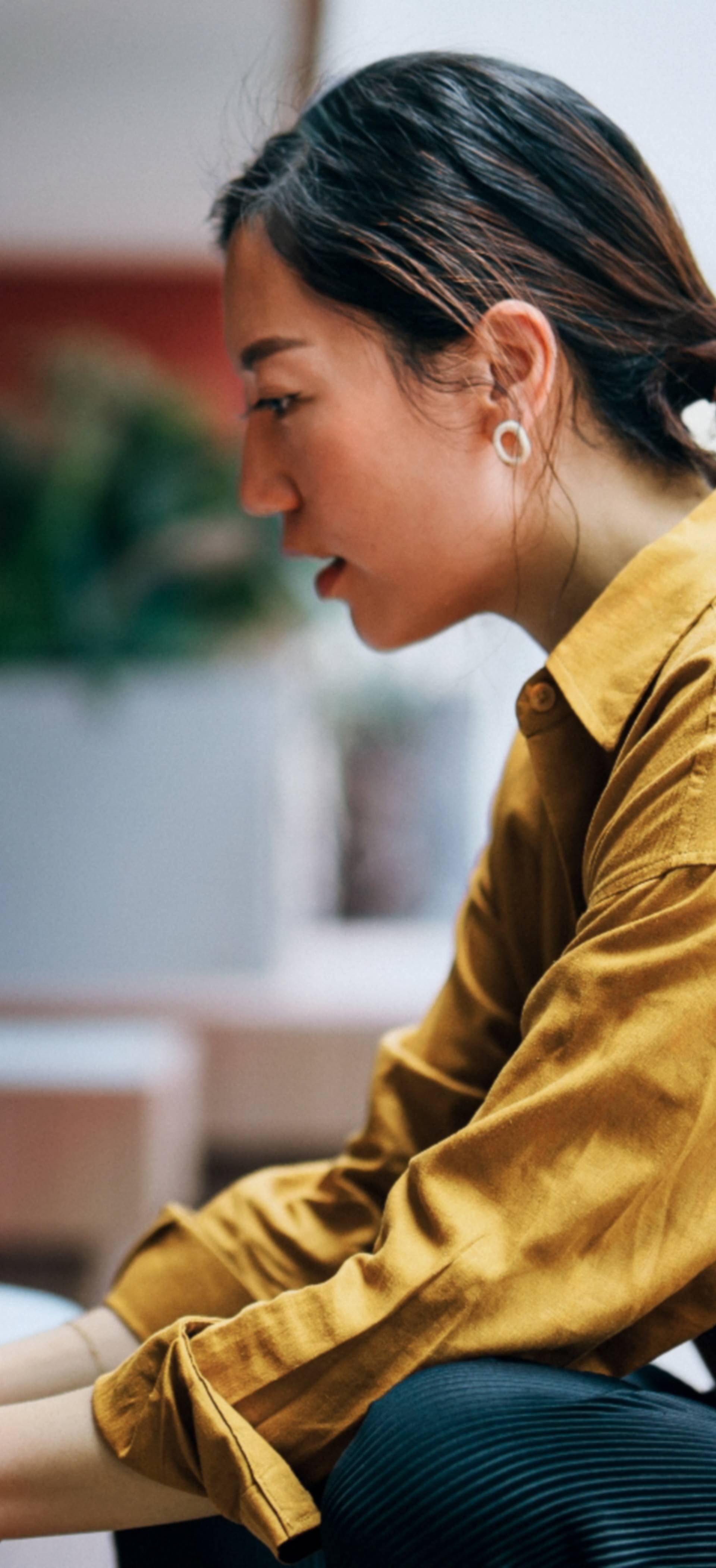 Woman writing on PC
